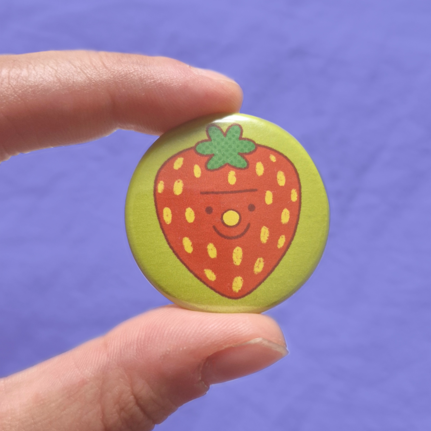 Smiley strawberry button badge