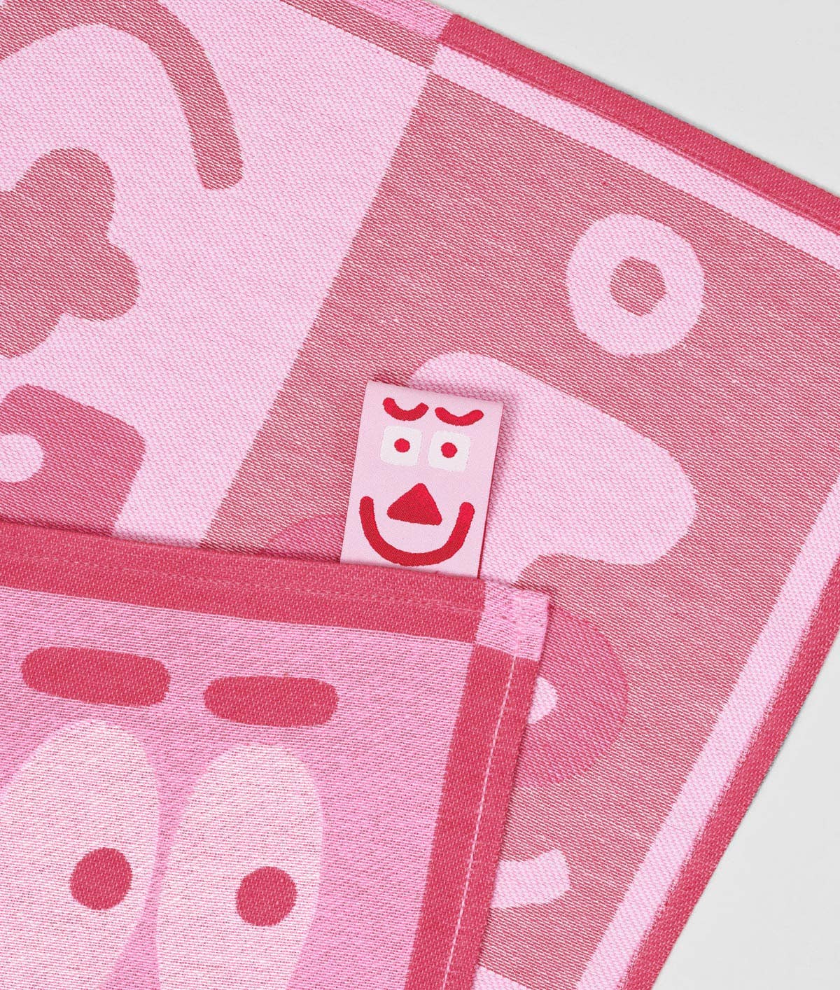 Faces Pink / Maroon Woven Cotton Tea Towel